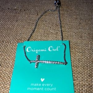 Silver bolo cross bracelet